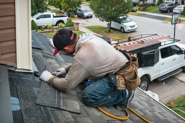 Professional Flat Roof Repair technician working in Huddleston, VA